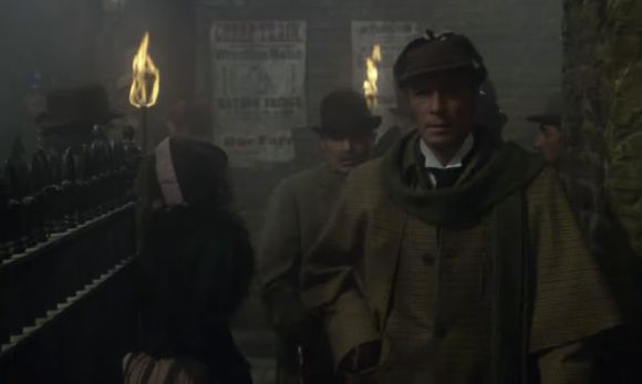 Sherlock Holmes and Dr Watson walk through the East End after Jack the Ripper has committed another murder.