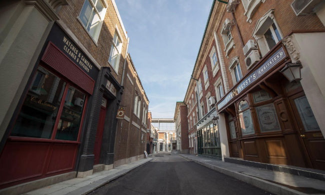 A bland London street with an Irish pub and a shop or two.