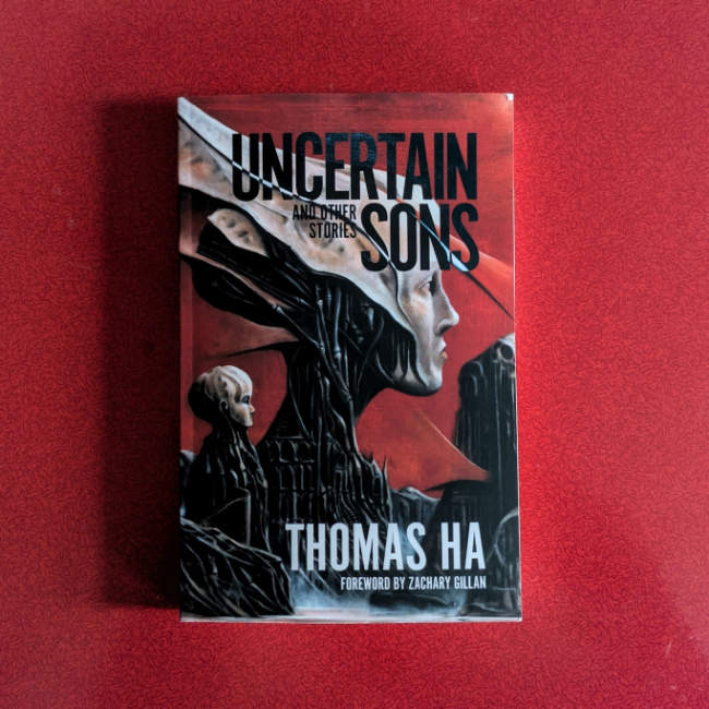 A paperback book with a cover image of horrific monstrous figures, half machine, half human, in a Gigeresque landscape.